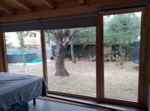 Ventanal madera y aluminio ( 1 hoja mas fijo  lateral)