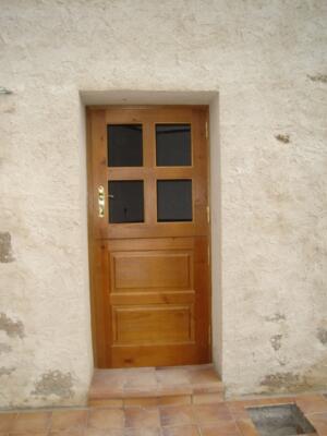 Puerta entrada exterior madera partida