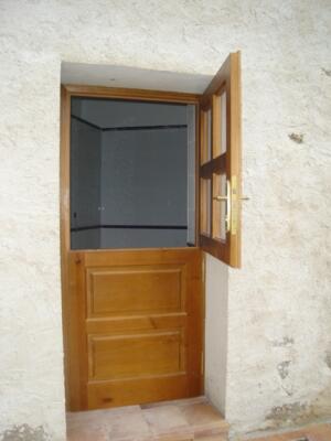Puerta entrada exterior madera partida